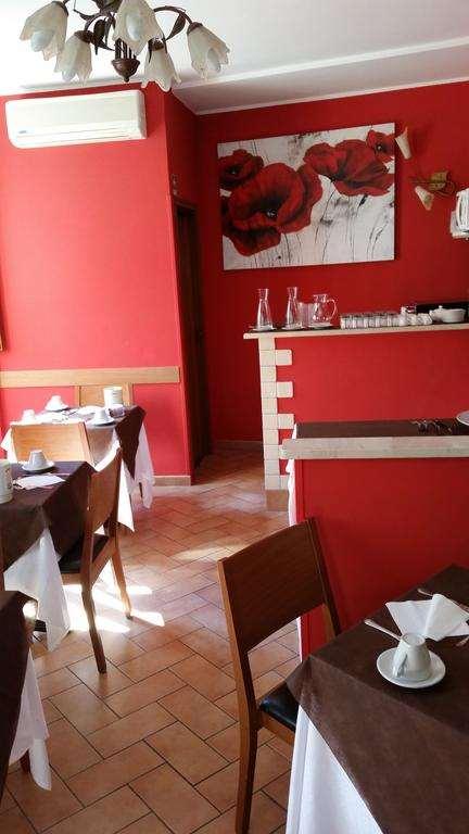 Hotel Properzio Ассізі Ресторан фото